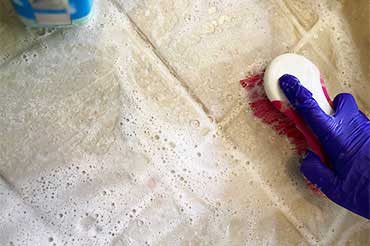 Shower stone-tiles removing stubborn water stain